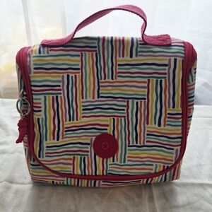 Kipling insulated lunchbox, Kichirou model, with a multicolored striped print.